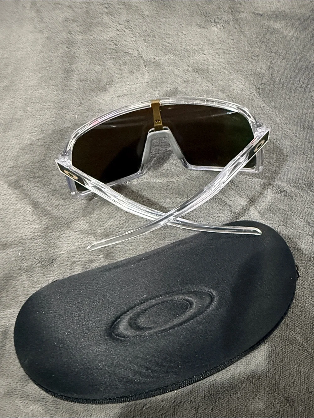 Oakley Clear Frame Sunglasses with Blue Mirrored Lenses